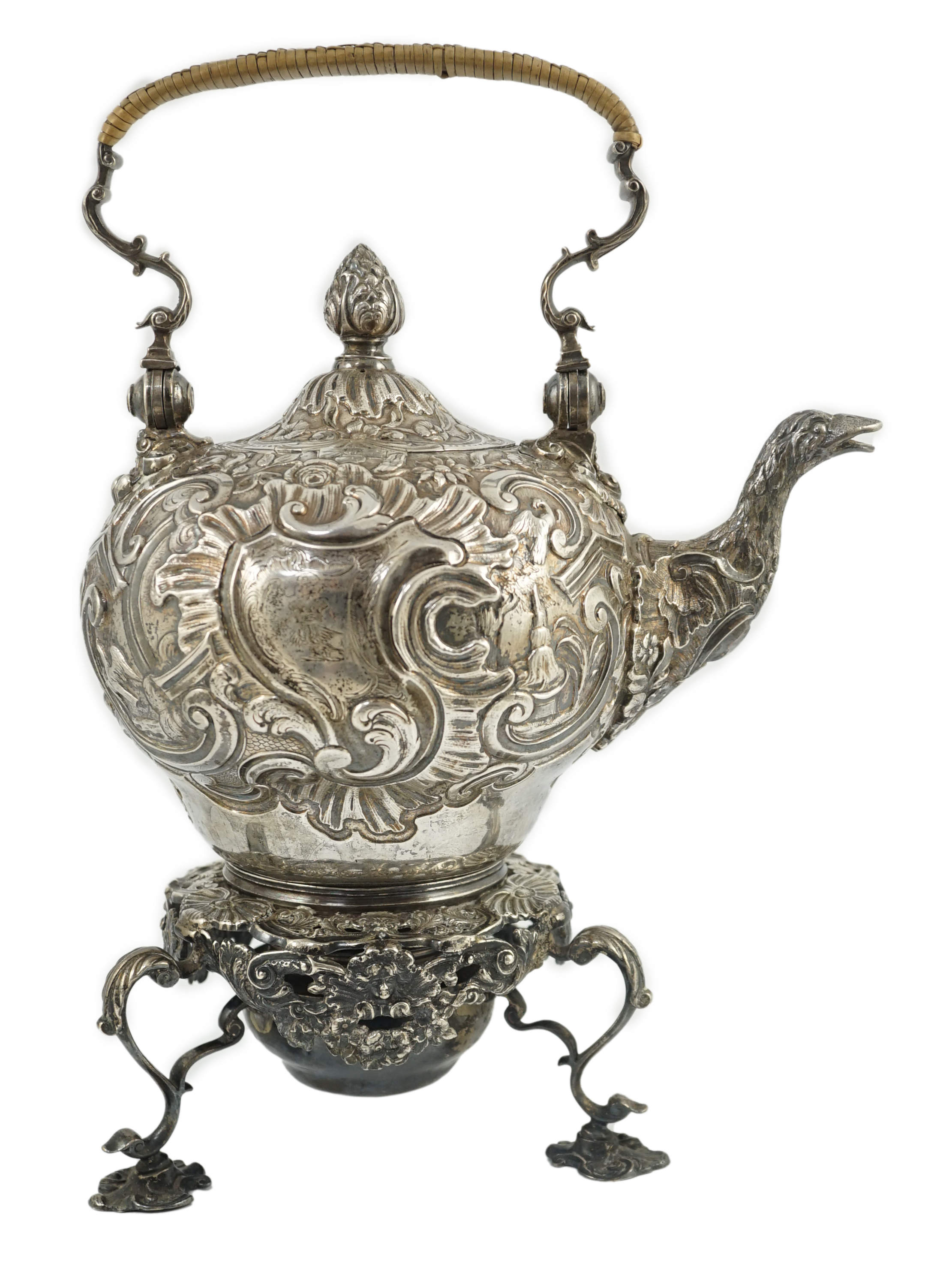 A George II embossed silver tea kettle on stand, with burner, by Francis Crump